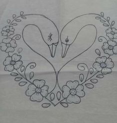 a drawing of two birds in a heart surrounded by flowers and leaves on a white sheet