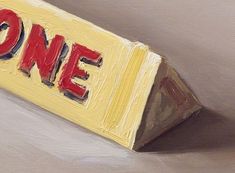 an acrylic painting of the word one on a piece of yellow and red paper