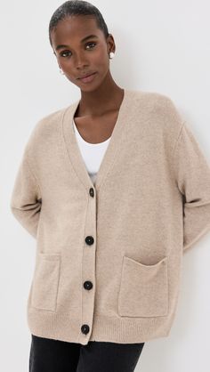 Find ANINE BING Jackson Cashmere Cardigan on Editorialist. Fabric: Mid-weight soft knit. V neck. Long sleeves. Button placket. Patch front pockets. Shell: 100% cashmere. Hand wash. Imported, China. Measurements: Measurements from size XS Length: 24.5in / 62.0cm, from shoulder Beige Cashmere Cardigan With Button Closure, Beige Cashmere V-neck Outerwear, Cashmere Workwear Cardigan With Button Closure, Cashmere Cardigan With Buttons For Work, V-neck Cashmere Outerwear With Buttons, Casual Beige Cashmere Sweater Coat, Cashmere V-neck Sweater Coat For Work, Relaxed Fit Merino Wool Cardigan For Work, Classic Cashmere Sweater With Pockets