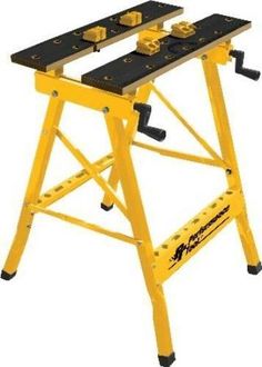 a yellow workbench with two tools on the top and one at the bottom