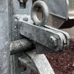 a close up of a metal latch on a door