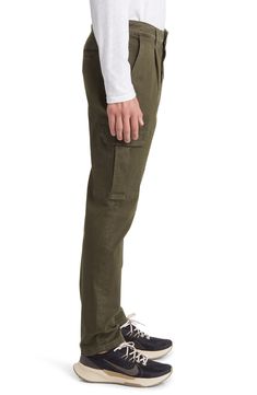 Rock a contemporary look in these stretch-twill pants made with a pleated waist, tapered legs and a mix of utility pockets. 32" inseam 97% cotton, 3% Lycra® spandex Machine wash, dry flat Imported Fall Cargo Pants With Pockets And Straight Hem, Tapered Straight Leg Cargo Pants With Belt Loops, Casual Tapered Work Pants With Belt Loops, Utility Style Tapered Leg Chinos With Side Pockets, Utility Tapered Leg Chinos With Side Pockets, Utility Chinos With Tapered Leg And Side Pockets, Fitted Cotton Cargo Jeans With Patch Pockets, Fitted Cargo Jeans With Patch Pockets, Casual Tapered Chinos With Belt Loops