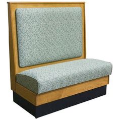 an upholstered wooden bench with blue fabric