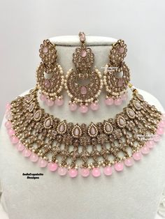 Gorgeous Antique gold Polki Necklace Set comes with beautiful earrings and tikka / Indian Jewelry/ High Quality Kundan and Polki Jewelry/ Bollywood Jewelry/Wedding Jewelry/baby pink  All items are shipped from Brampton, Ontario, Canada. If you need your item by a certain day, please reach out to us for express delivery option before placing the order so that we can update the shipping for you. Standard shipping/delivery timeline Below are the estimated delivery times after the order is shipped/d Pink Stone Work Tikka As Gift, Bollywood Style Pink Tikka With Stone Work, Pink Elegant Kundan Tikka, Elegant Pink Kundan Tikka, Pink Stone Work Tikka For Festive Occasions, Pink Stone Work Tikka For Wedding, Pink Bollywood Style Tikka As Gift, Pink Bollywood Tikka For Party, Festive Pink Jewelry Sets