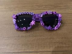 Cool sunglasses to wear in the summer. We can also do other motivational words on your sunglasses- check out our custom listings. This specific one is purpletastic Fun Purple Summer Sunglasses, Fun Purple Sunglasses For Summer, Casual Purple Glass Sunglasses, Fun Purple Tinted Sunglasses, Purple Tinted Fun Sunglasses, Fun Purple Sunglasses For The Beach, Fun Purple Sunglasses For Beach, Adjustable Purple Sunglasses With Gradient Lenses, Beaded Sunglasses