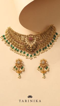 Crafted with intricate Nakshi work, this set exudes a vintage charm that will captivate all. Elevate your style and make a statement with this mesmerizing choker set, perfect for adding a touch of sophistication to any occasion. Ornate Kundan Bridal Necklace For Festive Occasions, Festive Ornate Kundan Bridal Necklace, Ornate Chandbali Kundan Necklace For Festive Occasions, Ornate Kundan Necklace For Reception, Ornate Festive Necklaces For Reception, Ornate Kundan Necklace With Intricate Design For Festive Occasions, Ornate Kundan Necklace For Diwali Festivities, Festive Ornate Kundan Necklace With Intricate Design, Intricate Design Choker For Receptions And Festivals