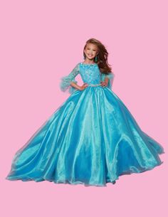 The Sugar Kayne C338 Preteen Pageant Dress is an elegant A-line ballgown featuring sequin and feather sleeves. Featuring the highest quality materials, this dress is perfect for special occasions and is sure to make your child feel like a princess. Experience twinkling elegance in this Metallic Organza Ballgown. The feathered sleeves are designed to make you feel like royalty. Color: Aqua, Petal Pink, WhiteSize: 2, 4, 6, 8, 10, 12, 14, 16Fabric: Organza, Metallic Organza, Mesh, Satin Lining(Size Elegant Organza Princess Dress For Fancy Dress, Elegant Ball Gown For Prom Season Fancy Dress, Princess Evening Ball Gown Pageant Dress, Princess Style Ball Gown Pageant Dress For Evening, Princess Style Evening Ball Gown Pageant Dress, Tulle Ball Gown For Fancy Dress Pageant, Pageant Dresses With Lace Sleeves, Elegant Feather Trim Dress For Pageant, Fitted Gown With Lace Sleeves For Pageants