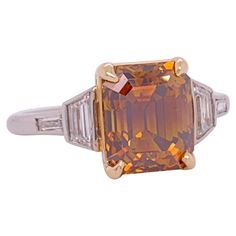 Chocolate Engagement, Orange And Chocolate, Heart Shaped Diamond Ring, White Diamond Rings Engagement, Contemporary Engagement Rings, Cognac Diamonds, Emerald Cut Diamond Ring, Platinum Diamond Rings, Modern Engagement Rings