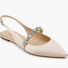 A Classic Sling Back Is A Wardrobe Staple For Its Versatility And No-Frills Design. With A Sharp, Pointed Toe And Low Vamp, The Flat-Soled Bambi Features A Decorative Strap Across The Middle Of The Foot To Add A Pop Of Glamour Without Any Fuss. It’s Easy To Dress This Shoe Up Or Down Or To Take From Day To Night. Slingback Closed, Pointed Toe Ankle Strap Closure Crystal Embellished Strap Flat Shoe Available In Satin And Metallic (Metallic Nappa Pu) German (Textured/Patterned) Rubber Sole Importe Elegant Flat Sandals For Formal Occasions, Elegant Synthetic Slingback Pumps For Wedding, Elegant Flat Sandals With Heel Strap, Elegant Flat Heel Slingback Pumps, Elegant Flat Heel Synthetic Slingback Pumps, Wedding Synthetic Slingback Pumps, Country Club Attire, Best Wedding Shoes, Comfortable Wedding Shoes