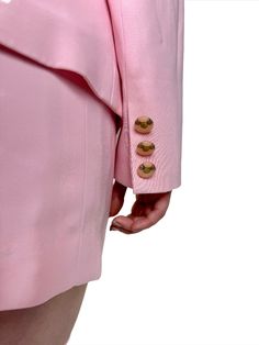 Even Cher Horowitz would be proud to strut in this baby pink vintage 90s suit by Clairvoyant. Complete with a mini pencil skirt, butterfly collared blazer, and unique ivory and silver buttons. The blazer is darted up the front and along the back to flatter your figure. Don't be clueless, you need this for your first day! Made in USA. Product Measurements: See the Measurement Guide in the photo carousel. Top Shoulder: 14.5" Chest: 36" Waist: 26" Sleeve Length: 21" Blazer Entire Length: 25" Skirt Pink Blazer With Button Closure For Formal Occasions, Pink Formal Blazer With Button Closure, Pink Party Blazer With Button Closure, Fitted Pink Blazer Dress For Office, Pink Notch Lapel Blazer Dress For Spring, Pink Blazer Dress With Notch Lapel, Pink Blazer Dress For Workwear, Pink Fitted Blazer Dress For Evening, Fitted Pink Blazer Dress For Evening