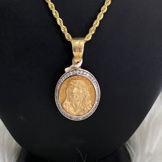 This product is avalilable to pick up in our Doral store.Features:Karat: 18K Gold.Color: Yellow Gold.Weight: 15,7gr "Price is only for pendant, chain is not included" Gold Diamond Oval Pendant Jewelry, Yellow Gold Oval Pendant With Diamond Cut, Yellow Gold Diamond Cut Oval Pendant, Diamond Rope Chain Necklace For Anniversary, Anniversary Diamond Rope Chain Necklace, Yellow Gold Coin Pendant Cross Jewelry, Spiritual Yellow Gold Jewelry With Rope Chain, 14k Gold Pendant Necklace With Rope Chain, Diamond Pendant With Rope Chain