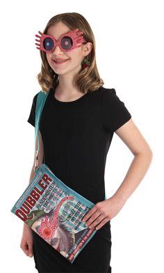 PRICES MAY VARY. Size: Standard 100% polyester, fabric-lined faux leather pouch measures 12" wide by 9" high Pouch has top zipper closure, inner patch pocket Length-adjustable webbing shoulder strap clips to D-rings at ends of pouch Outside of pouch has printed graphics to resemble the cover of "The Quibbler" Dive into the whimsical and wonderfully eccentric world of Luna Lovegood with this meticulously crafted Luna Lovegood Costume Accessory Kit, a treasure trove for fans who adore the unique R Luna Lovegood Accessories, The Quibbler, Luna Lovegood Costume, Harry Potter Luna, Comic Con Outfits, Faux Leather Pouch, Harry Potter Luna Lovegood, Wizard Costume, Whimsical Accessories