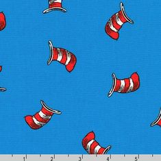 a blue background with red and white dr seuss hats