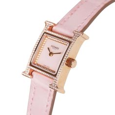 This Hermes XS Heure H watch is in 18k Rose Gold and crafted of 116 diamonds (0.233 ct) Diamond-set rose gold case, Anti-glare sapphire crystal, 52 diamonds (0.072 ct) Diamond-set Rose Opal dial, features a Matte Rose Pale Alligator watch strap, and Rose Pale dial with quartz movement.Origin: SwitzerlandCondition: New and never Accompanied By: Box, and watch box Size: 21mmMeasurements: Watch face: 21mm x 21mm; Strap Length: 6.5" circumference; strap width 17mm" Luxury Rose Gold Diamond Watch With Quartz Movement, Luxury Pink Gold Watches With Quartz Movement, Pink Watches Women, Forbes Cover, Pink Watch, Rose Pale, Rose Gold Case, Birkin 25, Gold Ounce