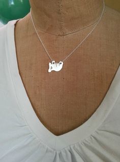 "Hanging Koala Bear Necklace, Sterling Silver Pendant, Animal lover Silhouette Charm This adorable Koala is so cute. The small charm necklace is hand made with love from solid sterling silver. It dangles by hanging on the chain through it's paws. Pendant Size ~ 11/16\" (16mm) W x 15/16\" (23mm) H Necklace Length ~ available in 16\", 18\", 20\" & 24\" Material ~ All Sterling silver, 925 Mixed breed? want YOUR dog? check out my custom silhouette TaGette necklaces https://www.etsy.com/shop/DiBA Cute Nickel-free Sterling Silver Necklaces, Cute Sterling Silver Necklace For Everyday, Cute Silver Hypoallergenic Necklace, Cute Hypoallergenic Sterling Silver Necklaces, Cute Hypoallergenic Sterling Silver Necklace, Cute Personalized Sterling Silver Necklace, Personalized Cute Sterling Silver Necklace, Cute Sterling Silver Charm Necklaces For Mother's Day, Cute Sterling Silver Charm Necklace For Mother's Day