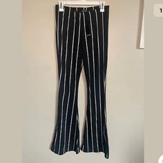 Nasty Gal Women’s Black/White Striped Flare Leg Trousers Size Us 10 Uk 14 Condition Is New With Tags. Shipped With Usps First Class Mail. Lightweight Fabric, Super Stretchy, Unlined, Pull On, Flare Leg Trousers Length From Waist To Hem 47” Waist Measured Flat Across 13” Inseam 33” Rise 12” Material: 95% Polyester 5% Elastane Trendy Fitted Black And White Bottoms, Pinstripe Flare Pants, Fitted Flare Striped Pants, Stretch Striped High-waisted Pants, Striped Stretch Wide-leg Pants, Flare Leg Trousers, Striped & Floral Print Flare Leg Pants, Trouser Pants Women, Jumpsuit Trousers