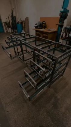 a metal frame sitting in the middle of a room