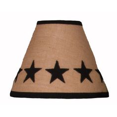 a lamp shade with black stars on the bottom and brown trimmings around it