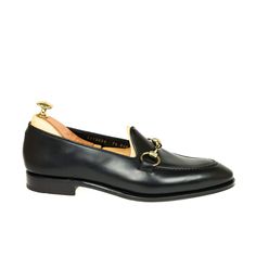 Horsebit loafers in black Classic Black Loafers With Horsebit Detail, Elegant Leather Shoes With Horsebit Detail And Round Toe, Elegant Leather Shoes With Horsebit Detail, Black Horsebit Loafers For Formal Occasions, Formal Black Loafers With Horsebit Detail, Formal Leather Shoes With Horsebit Detail And Round Toe, Formal Leather Shoes With Horsebit Detail, Luxury Slip-on Leather Shoes For Derby, Luxury Leather Slip-on Derby Shoes