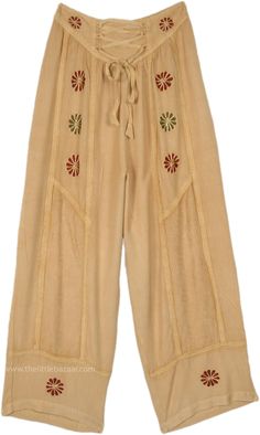 Free-flowing stonewashed straight-leg pants are perfect for any season. They impart effortless style with floral embroidery in burgundy and dark green. #tlb #SplitSkirtsPants #Stonewash #Embroidered #Misses #Pocket #Summerpants #greenpants #greenstreetpants Bohemian Wide Leg Bottoms With Floral Embroidery, Bohemian Cotton Pants With Floral Embroidery, Bohemian Floral Embroidered Bottoms For Festival, Green Bohemian Cotton Pants, Bohemian Long Pants With Floral Embroidery, Bohemian Straight Pants With Floral Embroidery, Casual Long Skirt With Floral Embroidery, Green Cotton Hippie Bottoms, Bohemian Embroidered Beige Bottoms