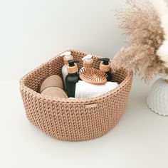 a basket that has some bottles in it