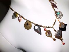 "All of these are from vintage broken or unmatched jewelry. I have cleaned it thoroughly with denatured alcohol. I think it came out well. The chain is stock I have had for a decade or so. The beads are carnelian, turquoise, faux pearls, etc. I have played with these bits and pieces for a long time making this one. :) It is about 20\" long and adjustable to 24 or 30. I will cut it to the length you want and can leave it adjustable. I am fastening it with a lobster claw closure. If you prefer a h Antique Metal Jewelry For Festivals, Nickel-free Antique Gold Metal Jewelry, Vintage One-of-a-kind Dangle Jewelry, Antique Jewelry With Dangling Charms For Collectors, Nickel-free Antique Gold Copper Jewelry, Antique Gold Jewelry With Vintage Charm For Collectors, Eclectic Gold Jewelry For Jewelry Making, Eclectic Gold Jewelry Gift, Vintage Brass Dangle Jewelry With Charm