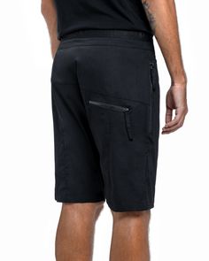 Side zipper shorts in black made from 100% stretchy cotton with front zip opening and drawstring belt for the perfect fit. Subtle vertical stitch detailing, long side zip pockets and inner secondary pockets to keep valuable items safe. Side zipper shorts in black low back zip pocket. • 100% cotton Black Bermuda Shorts With Side Pockets, Sporty Cotton Shorts With Belt Loops, Sporty Cargo Shorts With Belt Loops, Casual Black Shorts With Zipper Closure, Cotton Techwear Shorts, Techwear Cotton Shorts, Short Cotton Bottoms With Zipper Closure, Cotton Bottoms With Zipper Closure In Short Style, Functional Cotton Shorts With Built-in Shorts