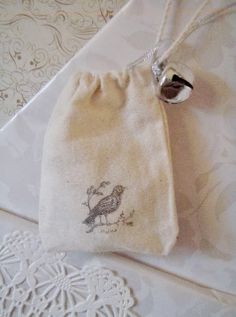 a small bag with a bird on it