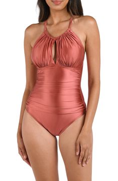 Head to the pool or beach in this ruched swimsuit fashioned with a shape-sculpting design and keyhole opening to expose a peek of skin. Adjustable back tie closure Convertible, adjustable tie straps Full back coverage Lined, with removable cups 76% nylon, 24% elastane Hand wash, line dry Imported Solid One-piece Swimwear With Ruched Back, Solid Color Ruched Back Tankini For Pool, Ruched Backless Swimwear For Pool, Elegant Solid Color Swimwear With Ruched Back, Elegant Nylon Swimwear For Pool, Elegant Swimwear With Ruched Back For Beach, Elegant Beach Swimwear With Ruched Back, Elegant Ruched Back Swimwear For Beach, Elegant Backless Tankini For Swimming