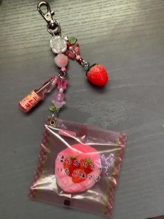 Japanese food, strawberry bread squishy keychain! 🍓  The strawberry bread charms packaging is plastic and the bread inside is a mochi (as far as I know), the strawberry charm is plastic or acrylic, and the ramune bottle is acrylic.  Some beads are glass Please note! Your order may be packed on Instagram (@chnjwls)  I have 4 dogs 2 shed (they live outside though) the chances of having animal fur are unlikely but it's still possible. Everything is handmade with care and love, comes with freebies! Ramune Bottle, Charms Packaging, Trinket Keychain, Squishy Keychain, Japanese Keychain, Mommy Milkers, Bread Squishy, Food Strawberry, Food Keychain