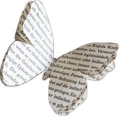 a paper butterfly with words written on it's back wings, flying through the air