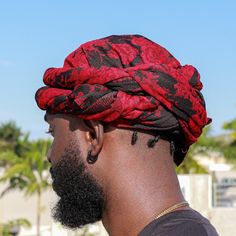 Red Flower Male Turban Made out of stretchable material. Cool on the head and also can be used to lay down hair. Can be styled it multiple ways. Arrives in 96x24 inches in length material which means you would have to tie it to your fitting on your head! WASH BEFORE USE. COLD WATER WASH THEN AIR DRY! How to tie? Watch This Quick Video! https://www.youtube.com/watch?v=7vBSvOsq6Ac Head Wraps For Men, Mens Turban Style, Men Head Wraps, Turban Style Mens, Head Scarf For Men, Mens Head Wrap, Men Turban, Turban For Men, Turban Men