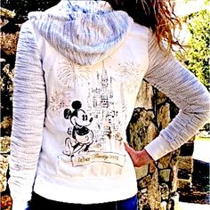 Super Cool Walt Disney World Parks Gold Embroidered Hoodie Jacket. Women’s Size S. Grey And White, Zipper Closure. Made With Mostly Cotton It’s Super Soft And Comfortable. Awesome Memorabilia For Walt Disney World/Mickey Mouse Fans. Very Stylish For Any Age! Hood Is Made With Double Fabric, Inside Lining Has Fun Disney Cinderella Castle Features In �‘Gold’ And Grey. Fireworks On The Back Is Made With Sparkling Glitter. Brand New! Never Used. Gently Washed Once. Please Refer To The Pictures For Me Disney Cinderella Castle, Hoodie Jacket Women, Disney Cinderella, Disney World Parks, Cinderella Castle, Sparkles Glitter, Embroidered Hoodie, Disney Tops, Jacket Women