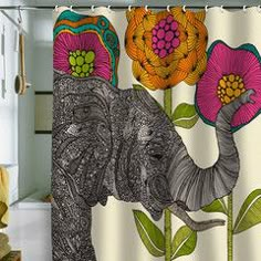 an elephant shower curtain with flowers on it