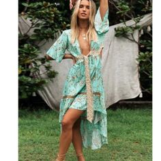 Floral Print Cut Out Plunging Neckline Maxi Dress Pre-Order Beachy V-neck Maxi Dress For Day Out, V-neck Floral Print Beach Dress For Brunch, Flowy Midi Dress For Spring Beach Cover-up, Beachy V-neck Flowy Mini Dress, Green V-neck Midi Dress For Beach, Beachy Flowy V-neck Mini Dress, Green V-neck Boho Dress For Spring, Chic V-neck Dress For Beach Party, Fitted V-neck Boho Dress For Beach