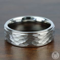 a wedding band that has been made to look like he is wearing a diamond pattern