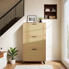 a wooden cabinet sitting next to a stair case