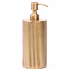 a gold colored soap dispenser with a metal handle on a white background