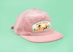 All cowgirls have a Wild Heart. Order more than 1 item and receive 10% off your entire order! Add more items for free shipping - orders over $35 ship free Soft Corduroy 5-panel camper style hat with sealed on full embroidered Wild Heart patch. Unisex. Adjustable back. Available colors: Soft Pink Cream Casual 5-panel Snapback Hat For Rodeo, Adjustable 5-panel Baseball Cap For Rodeo, Adjustable 5-panel Hat For Rodeo, Adjustable 5-panel Rodeo Hat, Pink Flat Bill Hat For Outdoor, Camper Hat, Western Girls, Heart Patch, Heart Patches