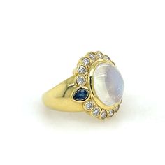 14KY MOONST CAB SAP .70TW DIA RING Luxury Jewelry Store, Diamonds Ring, Sapphire Diamond Ring, Sapphire Diamond, Pear Shape, Yellow Gold Rings, Estate Jewelry, Earring Necklace, Luxury Jewelry