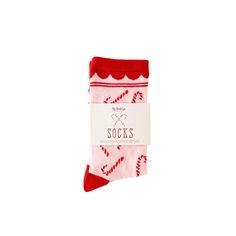 the socks are red and white with candy canes on them, which reads socks