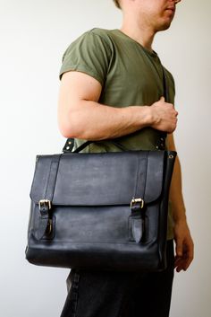 Upgrade your work style with our office bag for men, a sophisticated leather satchel designed for the modern professional. This messenger bag combines functionality with elegance, making it the perfect companion for daily commutes or business meetings. Crafted from high-quality leather, it offers ample space for documents, laptops, and other essentials, ensuring you stay organized and stylish. Ideal as a boss gift or a new job gift, this personalized business bag can be customized to add a uniqu Modern Waxed Finish Briefcase For Everyday Use, Classic Waxed Finish Satchel For Office, Classic Waxed Finish Office Satchel, Classic Business Laptop Bag With Waxed Finish, Classic Office Shoulder Bag With Waxed Finish, Rectangular Briefcase With Waxed Finish For Office, Classic Waxed Finish Shoulder Bag For Office, Business Laptop Bag With Waxed Finish Satchel, Business Laptop Satchel With Waxed Finish