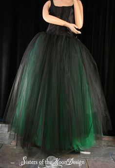 "Bridal Style tutu tulle skirt floor length! Made from 65+yards, five layers of soft smooth two black layers on top of three green layers on bottom Bridal tulle, all layers have been gathered and serged to the soft black fabric covered elastic waistband. This skirt is not made yet, It is made when ordered! Measurement: Sizes go by smallest waist size tutu will fit to largest Hips tutu fits over XSmall 24\"-34\"inches Small 26\"-38\"inches Medium 30\"-40\"inches Large 34\"-48\"inches XLarge 38\"- Tulle Crinoline Skirt For Costume Party, Crinoline Tulle Skirt For Costume Party, Black Tulle Full Skirt Petticoat, Black Crinoline Full Skirt Petticoat, Black Tiered Skirt Petticoat For Wedding, Black Full Skirt Crinoline Petticoat, Black Full Skirt Petticoat For Wedding, Black Long Tulle Petticoat, Black Crinoline Petticoat For Wedding