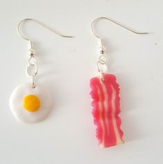 Super Cute Mini Fried Egg and Bacon Earring in Silver Plated or Sterling  Silver,  your choice!!! How cute is that!!The ear wire is silver plated or Sterling Silver, your choice!!For sure it will make a statement when you are wearing it!! Handmade Playful Sterling Silver Jewelry, Fun Sterling Silver Jewelry In Silver, Fun Sterling Silver Jewelry In Silver Color, Playful Sterling Silver Jewelry, Handmade Fun Sterling Silver Jewelry, Silver Playful Earrings, Playful Silver Earrings, Cute Single Sterling Silver Earring, Fun Handmade Silver Earrings