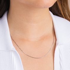 The perfect layering piece. We’ve offered customizable lengths so that this stunning box chain hits the perfect spot on your neck. Wear this chain solo for a sleek and simple look or add it to an assortment of other necklaces for that perfect golden base. Minimalist Curb Chain Necklace For Layering, Minimalist Hypoallergenic Snake Chain Necklace, Silver Snake Chain Necklace With Delicate Chain For Everyday, Dainty Silver Snake Chain Necklace With Delicate Chain, Dainty Silver Snake Chain Necklace With Delicate Details, Minimalist Snake Chain Necklace As Gift, Dainty Snake Chain Necklace For Layering, Minimalist Delicate Snake Chain Necklace For Gift, Minimalist Delicate Snake Chain Necklace As Gift