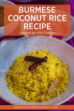 a bowl filled with yellow rice and spices