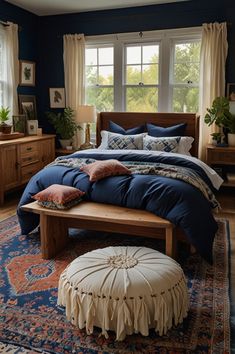 Create an elegant boho bedroom with deep navy blue walls and soft, layered textiles. Incorporate macramé wall hangings, earthy tones, and stylish furniture for a look that’s both refined and relaxed. #BohoBedroomIdeas #NavyBlue #InteriorDecor #ElegantStyle Bed Under Window Ideas, Boho Bedroom Blue, Navy Blue Boho Bedroom, Elegant Boho Bedroom, Blue And Brown Bedroom, Blue Boho Bedroom Ideas, Navy Blue Bedroom Walls, Blue Boho Bedroom, Bedroom Aesthetic Dark