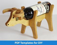 a wine bottle holder shaped like a cow