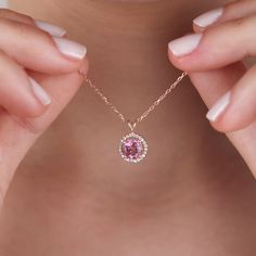 Check out our DeylanFineJewelry store for the very delicate and outstanding Necklaces and Rings.   ♡ PRODUCT FEATURES    - All items are handmade - Material Options: 8K Gold, 14K Gold, Sterling Silver - Color Options: Yellow Gold, Rose Gold, White Gold - Necklace Length Options: 40 cm / 16 Inches, 45 cm / 18 inches, 50 cm / 20 inches, 55 cm/ 22 inches - Gemstone Options: CZ Diamond - Pink Topaz: 1 pce / 6.00 MM  - Round Diamond: 24 pcs / 0.10 ct / 1.00 MM - Total Number of Stones: 25 - Total CTW: 0.10 Ctw - Diamond Color-Clarity: F-G Color SI Clarity ✰ Important Note; - All diamonds stones are natural, not lab-created. ♡ PACKAGING   - All orders come in our high-quality packaging that is gift-ready. If you want to add a gift message, you can contact me via message.   ♥ Gift Packaging - All Delicate Jewelry With Halo Setting For Gift, Delicate Jewelry With Halo Setting As Gift, Cubic Zirconia Necklaces With Accent Stones, Delicate Halo Setting Jewelry For Gift, Pink Gemstone Accents Round Necklace, Round Gemstone Birthstone Necklace For Wedding, Round Pendant Jewelry With Accent Stones For Gift, Fine Jewelry Necklaces With Round Cut Accent Stones, Fine Jewelry Necklaces With Round Accent Stones