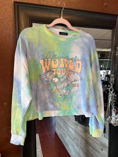 Make a statement with this Dreamer World Tour America tie dye long sleeve graphic tee! It's the perfect way to show off your sense of wanderlust and fashion savvy! Pink & yellow OR green & blue. Long Sleeve Graphic Tee, Head Wrap Scarf, Tie Dye Long Sleeve, Jean Leggings, Graphic Tee Shirts, Plus Size Dress, Blue Bags, World Tour, Pink Yellow